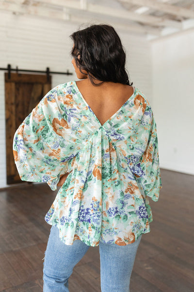 FabledinFloralDrapedPeplumTopinIvory5_600x600.jpg